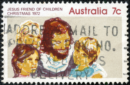 AUSTRALIA - CIRCA 1972: A Stamp printed in AUSTRALIA shows the Jesus and Children, Christmas issue, circa 1972のeditorial素材