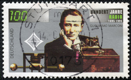 GERMANY - CIRCA 1995: Postage stamp printed in Germany, dedicated to the 100th anniversary of the invention of radio, shows an engineer, physicist, Nobel Prize winner, Guglielmo Marconi, circa 1995のeditorial素材