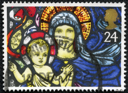 GREAT BRITAIN - CIRCA 1992: a stamp printed in the Great Britain shows Madonna and Child, Stained Glass Window, Christmas, circa 1992のeditorial素材