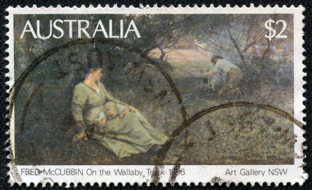 AUSTRALIA - CIRCA 1981: Postage stamp printed in Australia with image of a 1896 painting, On the Wallaby Track, by Fred McCubbin from the Art Gallery of South Australia.のeditorial素材