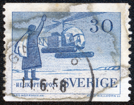 SWEDEN - CIRCA 1958: stamp printed by Sweden, shows Helicopter Mail Service, circa 1958の写真素材