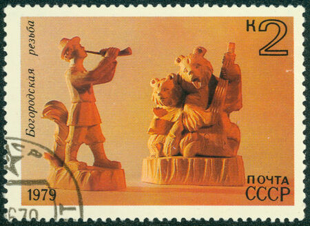 RUSSIA - CIRCA 1979: stamp printed by Russia, shows Horn player and bears playing balalaika from Bogorodsk, circa 1979のeditorial素材