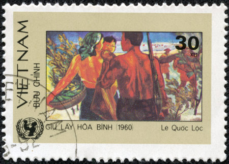 Stamp printed in Vietnam shows pickers harvest (1960), circa 1980の写真素材