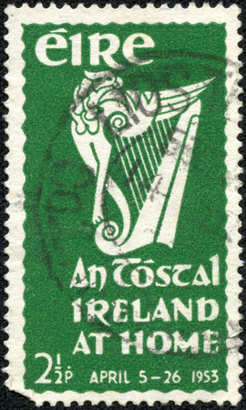 A stamp printed in Ireland shows An Tostal Ireland at home, circa 1953の写真素材