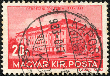 CHONGQING, CHINA - May 10, 2014:stamp printed by Hungary, shows 19th cent. view of College of Debrecen, circa 1938のeditorial素材