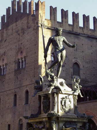 Neptune Fountain and king Enzo's Palace, Bologna, Italyの写真素材