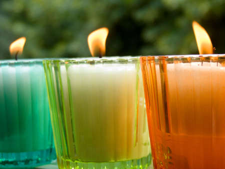 Colored glass potted candlesの写真素材