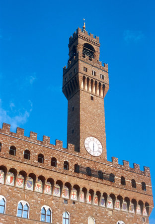 The clock tower of Palazzo Vecchio in Florenceの写真素材