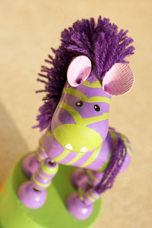 Close-up of a wooden zebra toyの写真素材