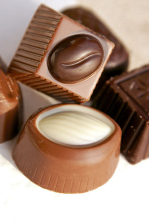 Macro of some mixed filled chocolate candies with copy space. Shallow DOFの写真素材