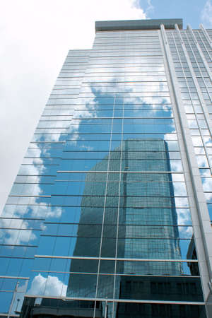 Downtown Toronto skyscraper with reflection of clouds and skyscraperの写真素材