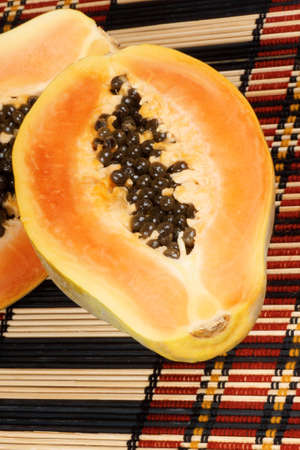 Close-up of a half cut ripe papaya fruitの写真素材