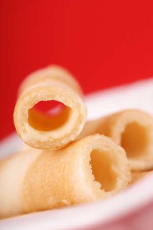 Macro of some small cylindrical wafer. A lot of copy space space. Selective and soft focus.の写真素材