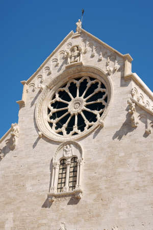 Ruvo di Puglia Cathedral in the southeast italian region of Apulia. The simple but elegant facade shows a lot of statues with vegetal, animal and human details. The Cathedral was dedicated to Santa Maria Assunta and was built between 12th and 13th centuryの写真素材