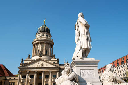 Detail of the French Dome and the monument to german poet Friedrich Schiller in Gendarmenmarkt Square in Berlin.の写真素材