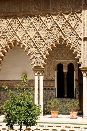 Mudejar decorations in the Patio de las Doncellas  Courtyard of the Maidens  from Peter the first Palace in the Royal Alcazars  Reales Alcazares  of Seville, Spain  Mudejar Style in architecture and decoration was born in 12th century after Christian Recoの写真素材