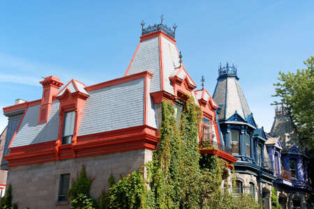 Colorful victorian houses in Montreal called Painted Ladiesの写真素材