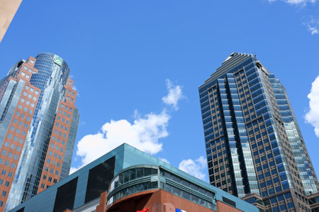 Montreal, Canada - July 28, 2008: glimpse of downtown Montreal and some modern skyscrapers: the 1501 McGill College, better known as La Tour McGill (on the right) and the Maison Astral (on the left).のeditorial素材