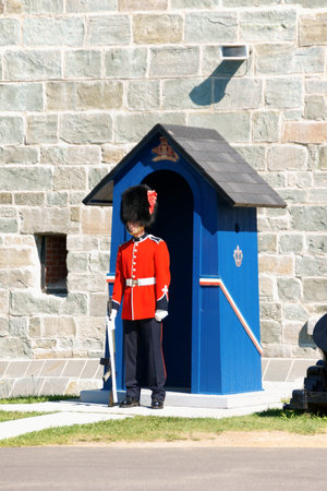 Quebec City, Canada - August 15, 2008: A soldier from Royal 22nd Regiment with gun stands in front...