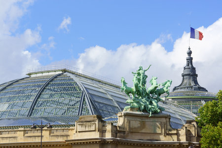 Paris, France - August 18, 2013  the Grand Palais des Champs-ElysÃ©es in Paris, France  This building in Beaux-Arts architecture style was built for Universal Exposition of 1900 and made of glass, iron, steel and concrete  It rises on the Champs-ElysÃ©es のeditorial素材