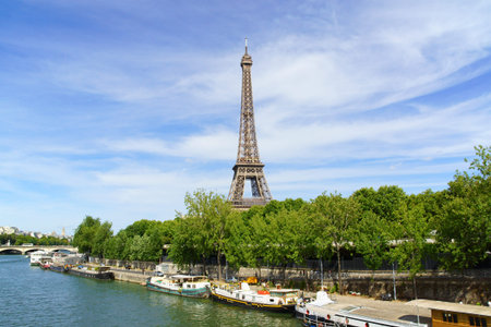 Paris, France - August 17, 2013  Eiffel Tower  Tour Eiffel  and tour boats called  bateaux mouches ...