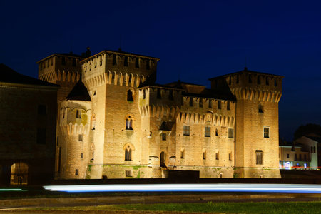Mantua, Italy - June 15, 2013  Castello di San Giorgio by night in Mantua, Italy  This castle was built in 1395 by Bartolino da Novara for Gonzaga family at the entrance of the town  It is a part of the complex called Palazzo Ducale  Ducal Palace   Some pのeditorial素材