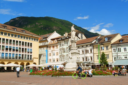 Bolzano, Italy - August 21, 2014: Walther Square (Piazza Walther) built in 1808 by order of King Massimiliano di Baviera, and initially named after him. In 1901 it was dedicated to Walther von der Vogelweide (1170-1230) a German poet of the Middle Ages. Iのeditorial素材