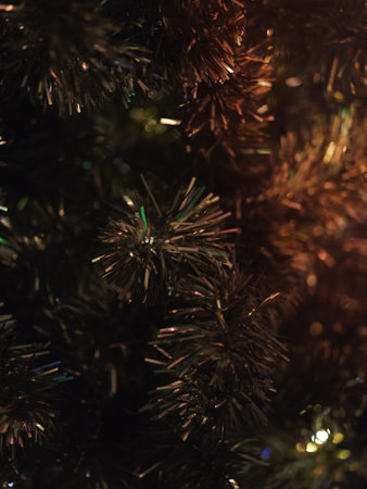Christmas and Happy new year on blurred bokeh christmas tree . Golden tone . SPACE FOR TEXTの写真素材