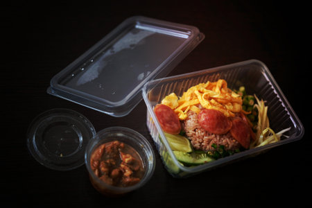 Close up of rice Mixed with Shrimp paste in package Delivery . Thai foodの写真素材