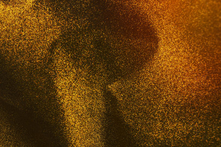 Gold glitter background, Gold abstract background with blurred bokeh, Abstract bokeh lights with soft light background.の写真素材