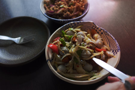 THAI FOOD  , Spicy papaya salad with cockleの写真素材
