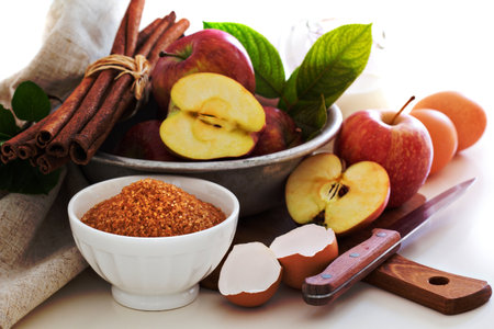 Baking and cooking with apple, sugar and cinnamonの写真素材