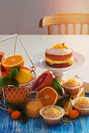 Baking with citrus fruits victoria sponge cakeの写真素材