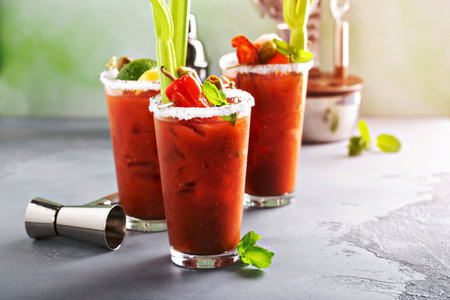 Bloody mary cocktails with garnishes for brunchの写真素材