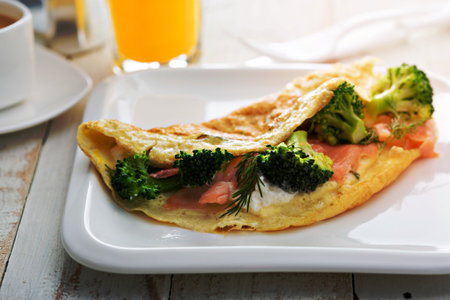 Egg-white breakfast omelet with salmon and broccoliの写真素材