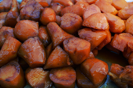 Honeyed sweet potato, typical Mexican dessert. Camote enmelado, close up.の写真素材