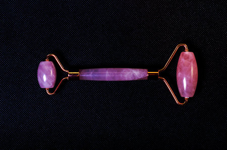 rose quartz facial roller and massage stone gua sha isolated on white background, flat lay
Top view on jade facial roller and gua sha tool  on white background. Facial massage kit for lifting massage therapy, home spa. Mock upの写真素材