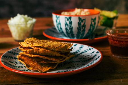 Tostada of corn, typical mexican food. Tostadas on a plate on a wooden table.の写真素材
