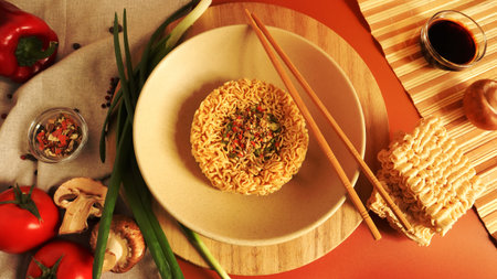 Instant noodles with king mushrooms, seasonings, soy sauce, peppers, green onions, tomatoes....