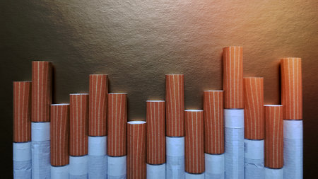 Image of several commercial cigarettes. pile of cigarettes on a gold background or concept of anti-smoking campaign, tobacco.の写真素材