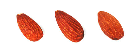 almonds natural roasted isolated on white backgroundの写真素材