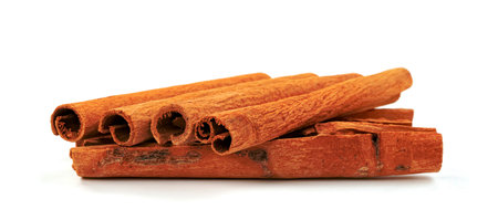cinnamon sticks isolated on white backgroundの写真素材