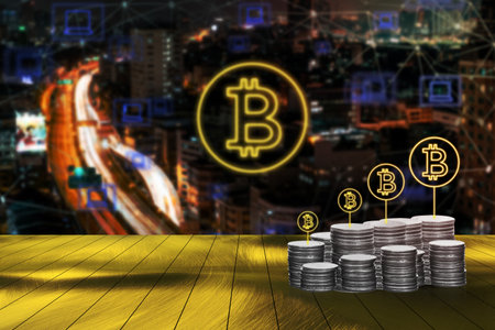 Digital money with bitcoin symbol and network connection concept with blurred cityscape backgroundの写真素材