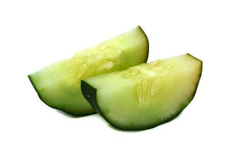Fresh japanese cucumber sliced isolated on white backgroundの写真素材