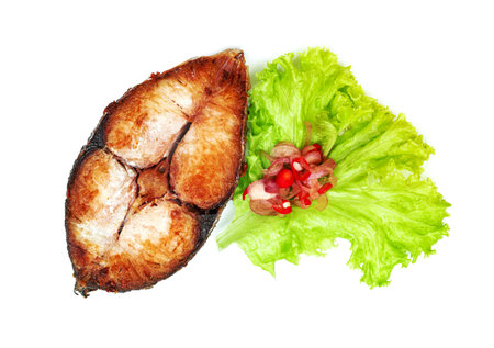 King mackerel or spotted mackerels steak isolated on white background ,fried Scomberomorus fishの写真素材