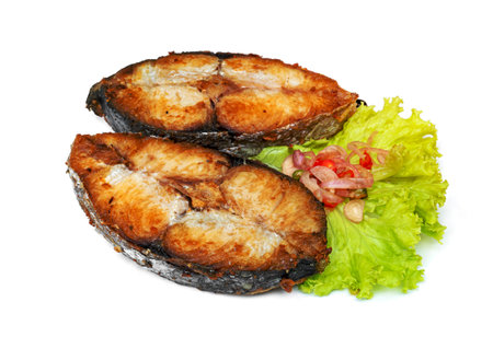 King mackerel or spotted mackerels steak isolated on white background ,fried Scomberomorus fishの写真素材