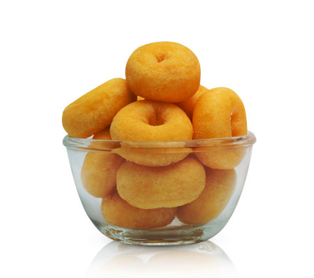 small sugar ring donut with glass bowl isolated on white background ,include clipping pathの写真素材