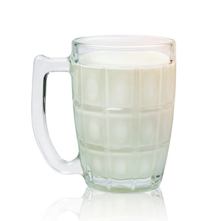 milk in transparent glass isolated on white background ,include clipping pathの写真素材