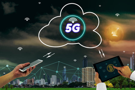 5G network interface and icon on cloud concept,businessman using tablet and cellphone with cityscape backgroundの写真素材