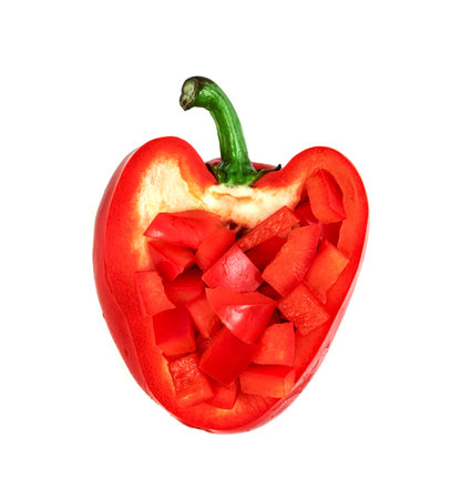 red chopped sweet bell pepper isolated on white backgroundの写真素材